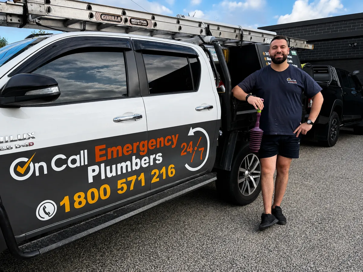 Emergency plumber beside a service vehicle in Melbourne